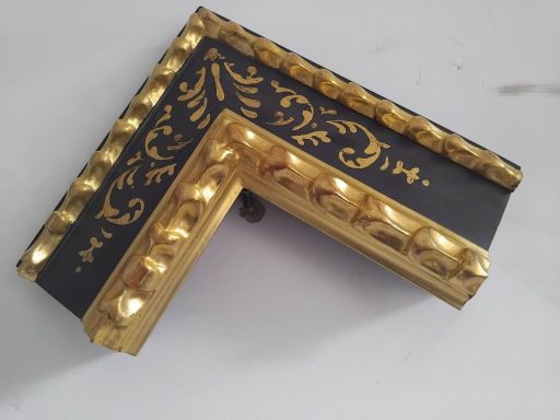 Italian reproduction, with sgraffito decoration, wood carved leaf line